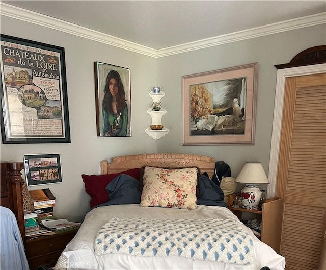 bedroom featuring ornamental molding