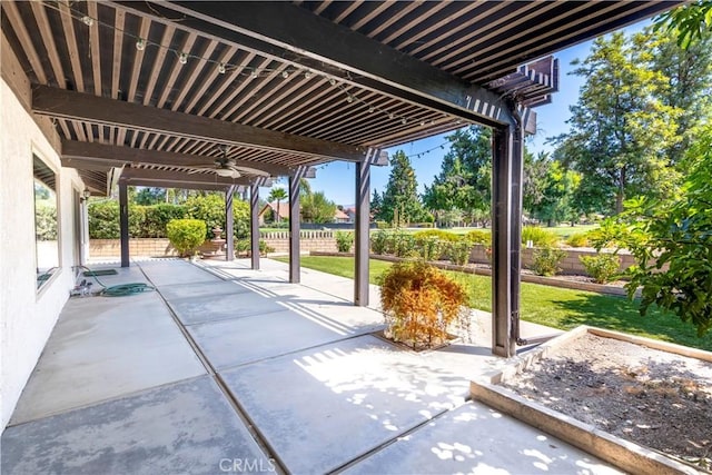 view of patio featuring ceiling fan and a pergola