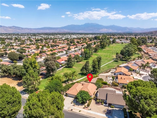 drone / aerial view featuring a mountain view