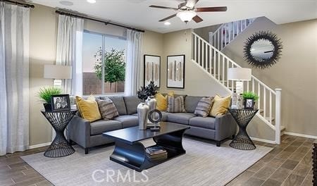 living room with dark hardwood / wood-style floors and ceiling fan