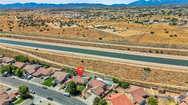bird's eye view with a mountain view, a desert view, and a rural view