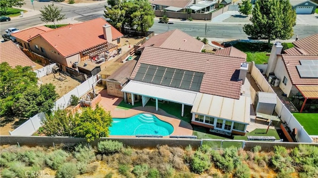 birds eye view of property with a residential view