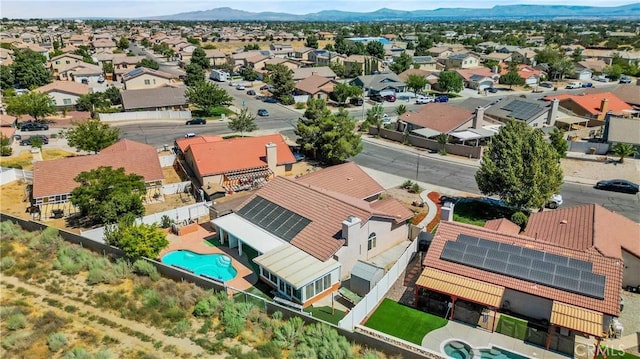 birds eye view of property with a residential view and a mountain view