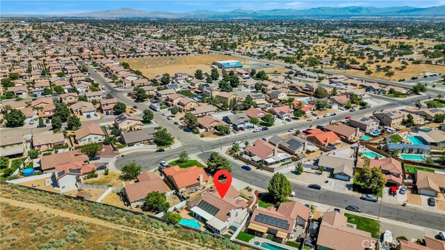 bird's eye view with a mountain view