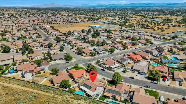 birds eye view of property featuring a residential view and a mountain view
