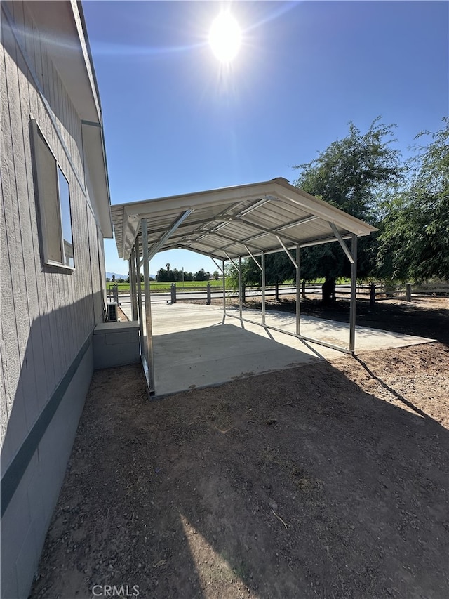 view of car parking featuring a carport