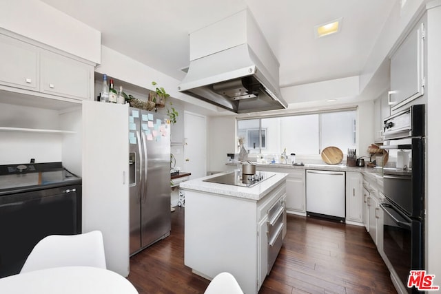 kitchen with dark wood-type flooring, white cabinets, black appliances, a center island, and extractor fan