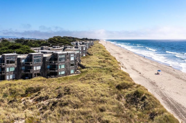 aerial view featuring a beach view and a water view