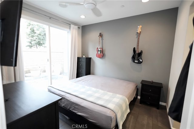 bedroom with dark wood-type flooring and ceiling fan