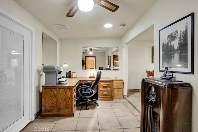 office area with light tile patterned floors