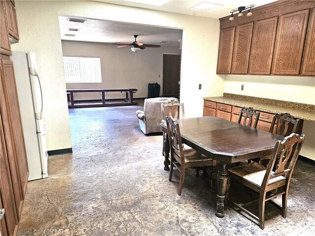 dining area featuring ceiling fan