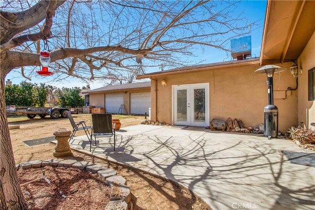 view of patio featuring french doors