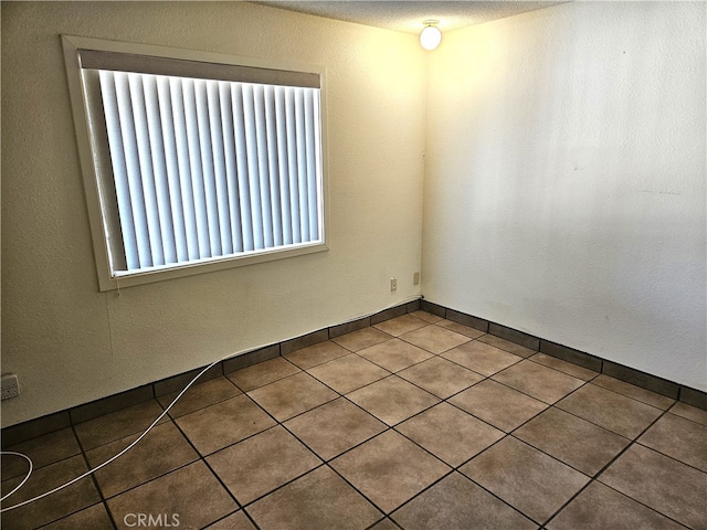 view of tiled empty room