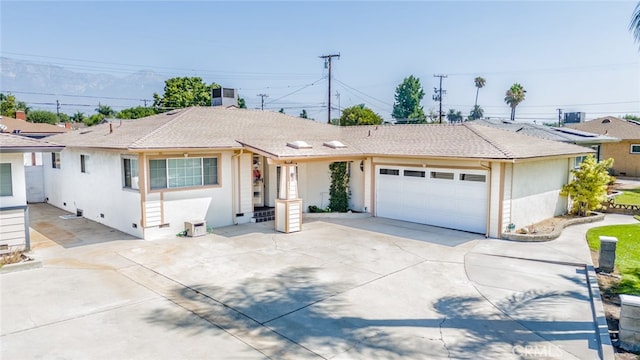 ranch-style house with a garage