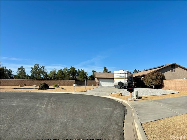 ranch-style home featuring a garage