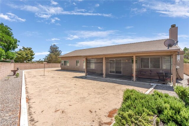 back of house featuring a patio area