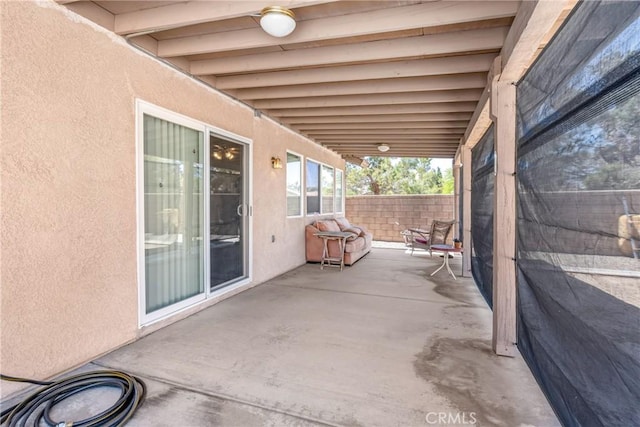 view of patio with fence