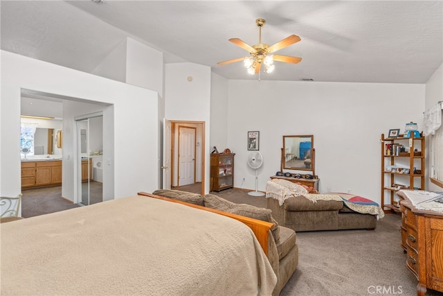 bedroom with a textured ceiling, carpet flooring, high vaulted ceiling, ensuite bathroom, and ceiling fan