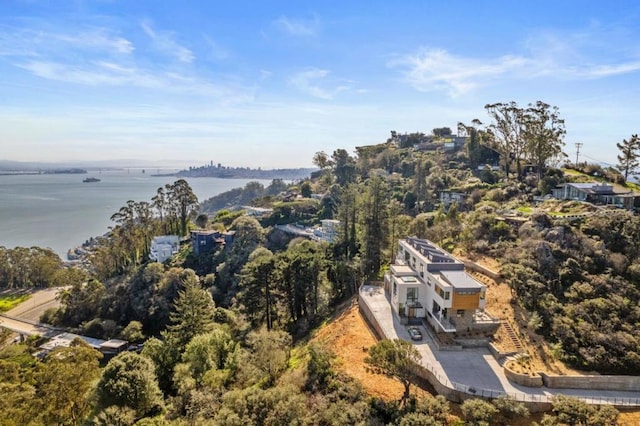 birds eye view of property featuring a water view