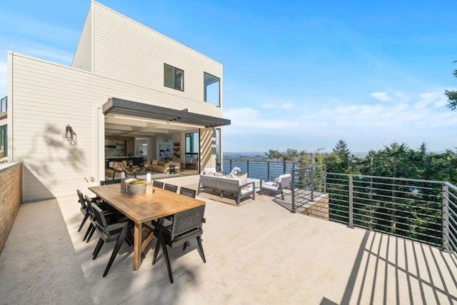 view of patio featuring a water view and an outdoor hangout area