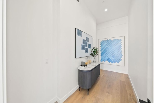 hallway featuring hardwood / wood-style floors