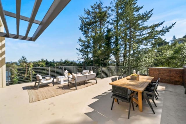 view of patio / terrace with an outdoor hangout area and a pergola