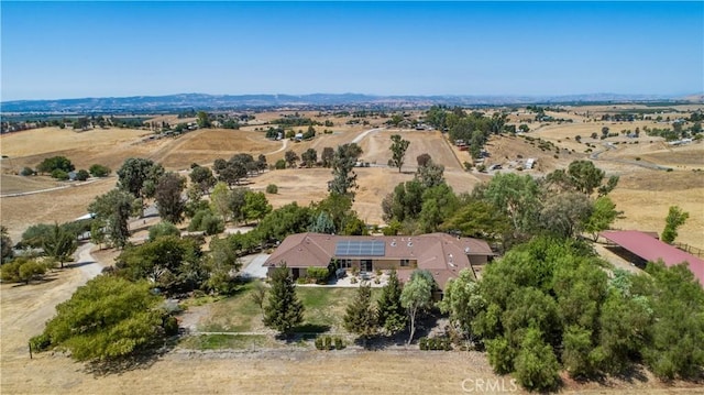 birds eye view of property with a rural view