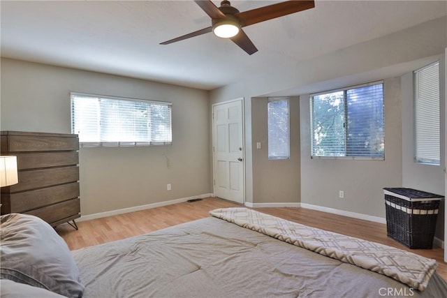 bedroom featuring ceiling fan and light hardwood / wood-style flooring