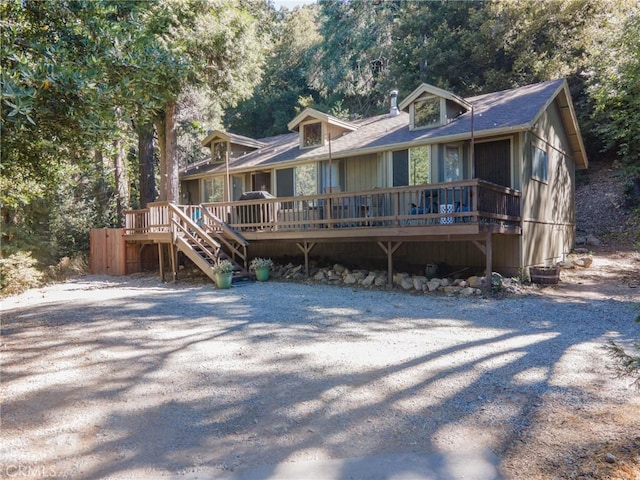 view of front of property featuring a wooden deck