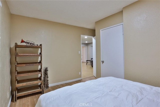 bedroom featuring light hardwood / wood-style floors