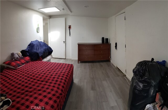 bedroom featuring light wood-type flooring