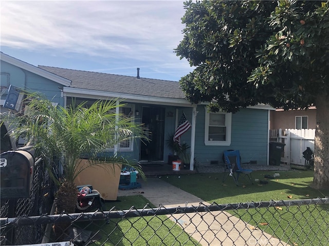 view of front of home with a front yard