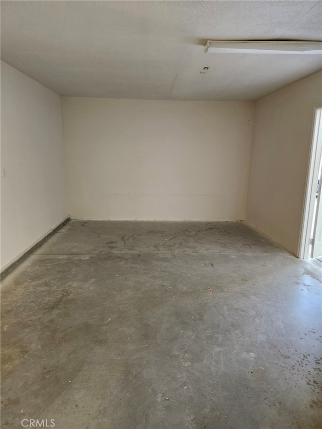 empty room featuring concrete floors