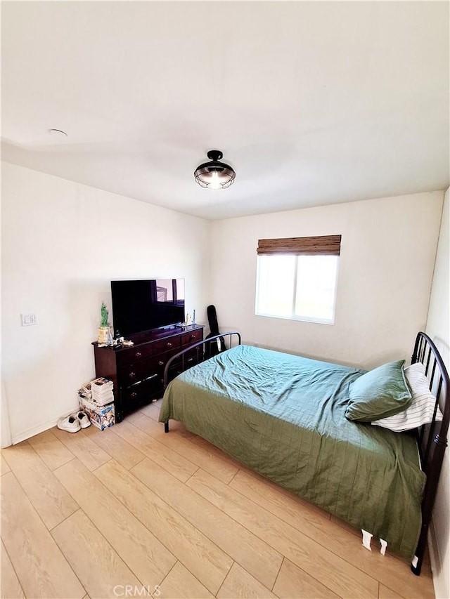 bedroom featuring light hardwood / wood-style flooring