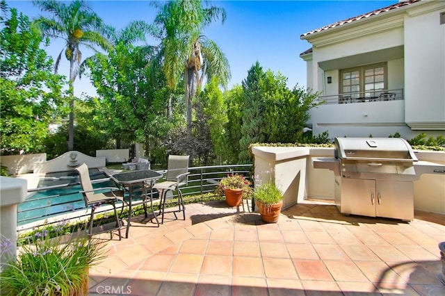 14057 Valley Vista Blvd, Sherman Oaks, CA 91423 - view of patio featuring area for grilling and outdoor dining space