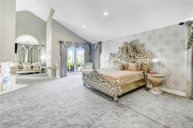 carpeted bedroom featuring high vaulted ceiling and access to outside