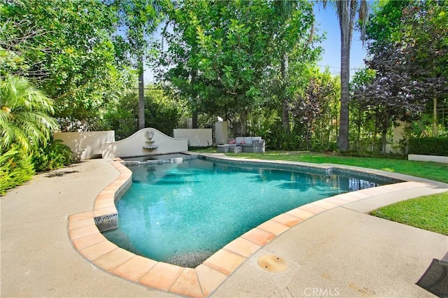 view of pool featuring a patio