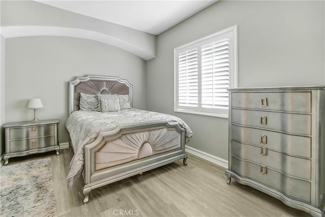 bedroom with light wood-type flooring