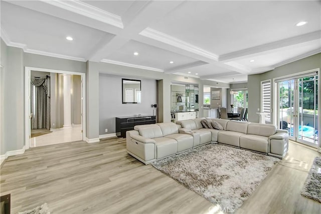 living room with beamed ceiling, light hardwood / wood-style floors, and coffered ceiling