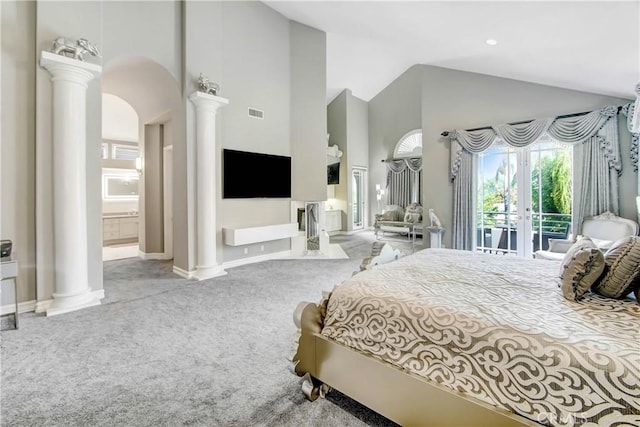 bedroom with access to exterior, french doors, carpet floors, and high vaulted ceiling