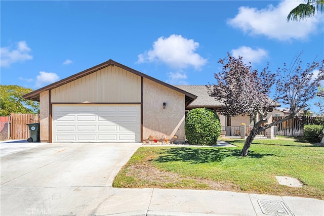 single story home featuring a front yard and a garage