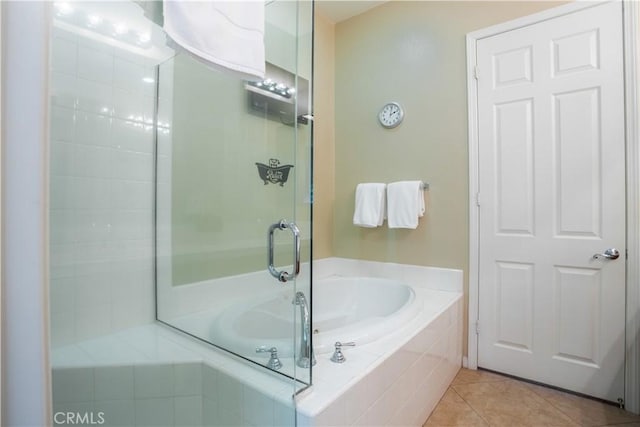 bathroom with tile patterned flooring and plus walk in shower