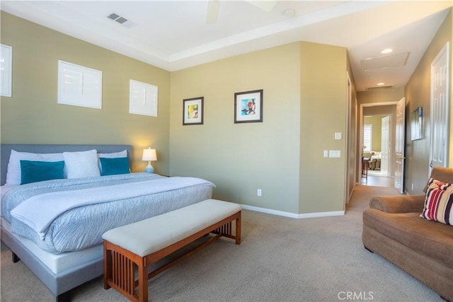 bedroom featuring ceiling fan and light carpet