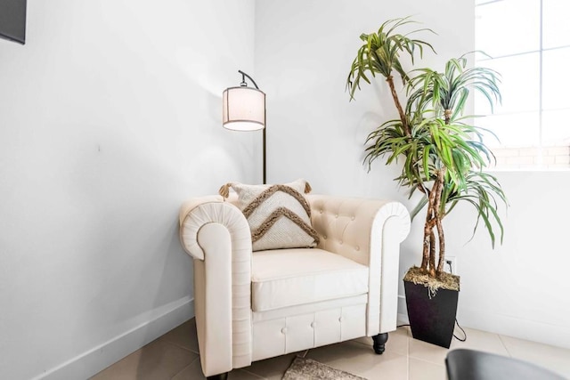 sitting room featuring light tile patterned floors