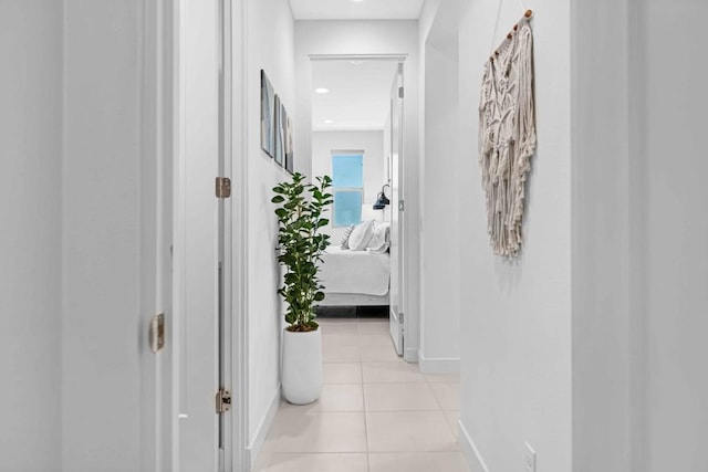 hallway with light tile patterned floors