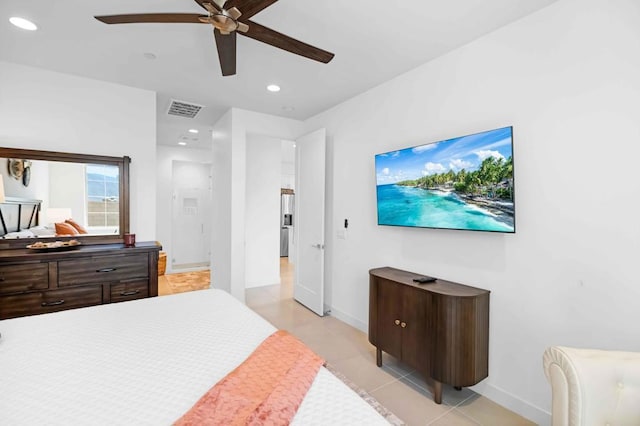 bedroom featuring ceiling fan and light tile patterned flooring