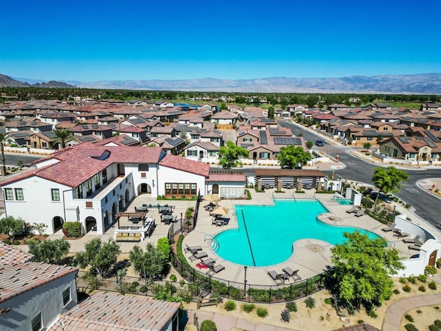 drone / aerial view featuring a mountain view