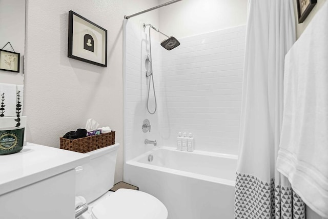 bathroom featuring toilet and shower / bath combo