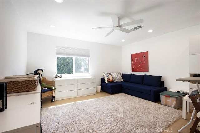 living room with ceiling fan