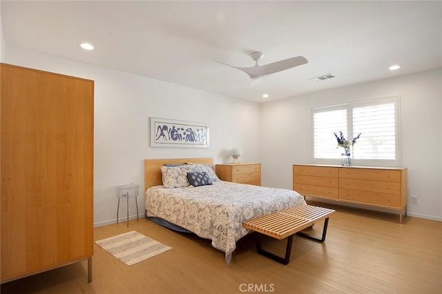 bedroom featuring wood-type flooring and ceiling fan